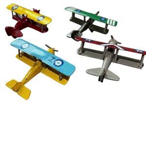 Set of 4 bi-wing airplanes, die cast metal and plastic to attach wings.